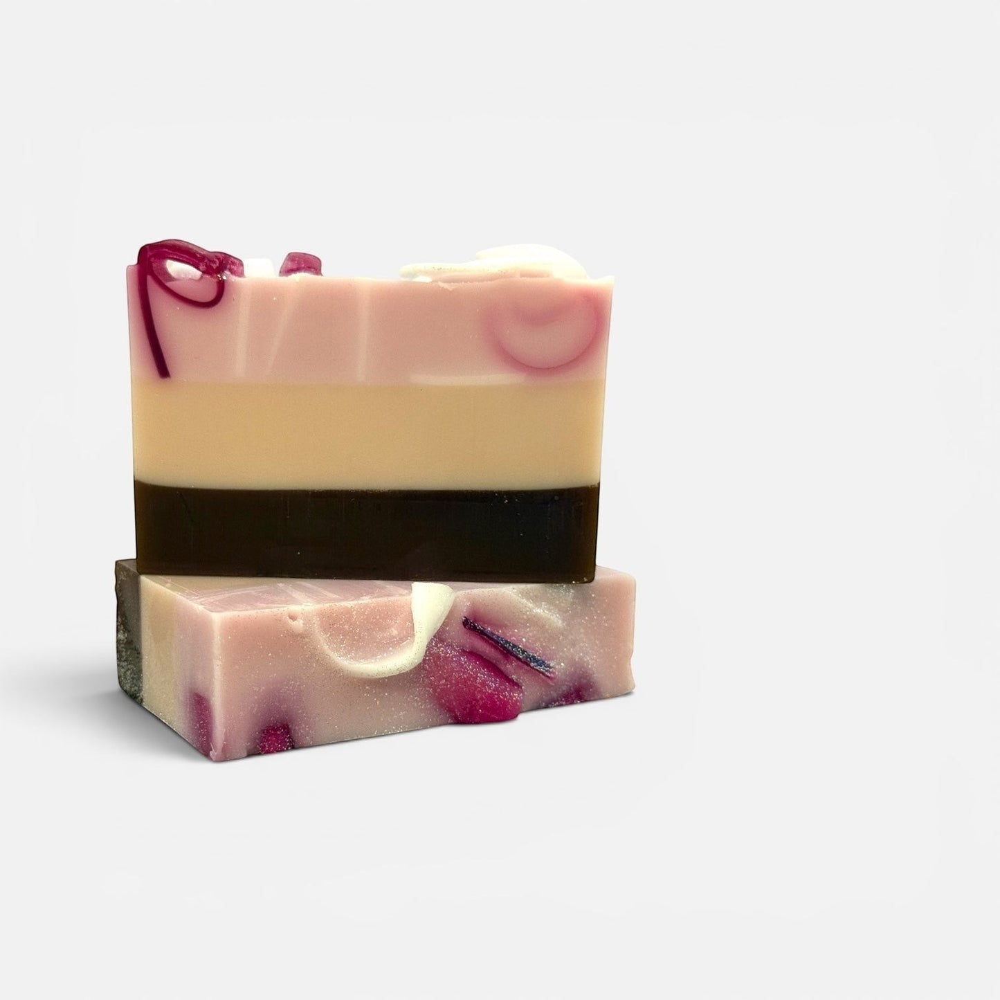 Harry’s Mama’s Faves: Lotions & Potions handmade Figs & Sugar bar soap with layered pink, cream, and dark brown colors.