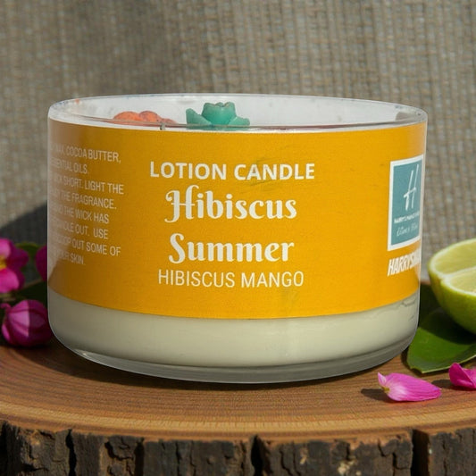 Harry’s Mama’s Faves: Lotions & Potions Hibiscus Summer lotion candle in glass vessel with yellow label, melts into lotion.