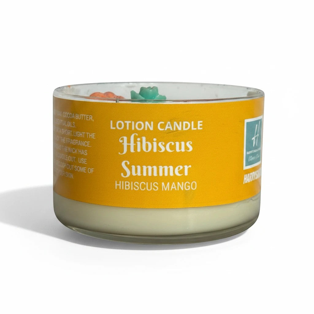 Harry’s Mama’s Faves: Lotions & Potions Hibiscus Summer lotion candle in glass vessel with yellow label. Coconut soy wax blend.