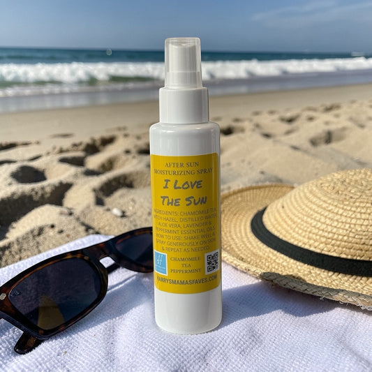 Harry’s Mama’s Faves: Lotions & Potions after sun moisturizer spray with aloe and chamomile on a beach towel