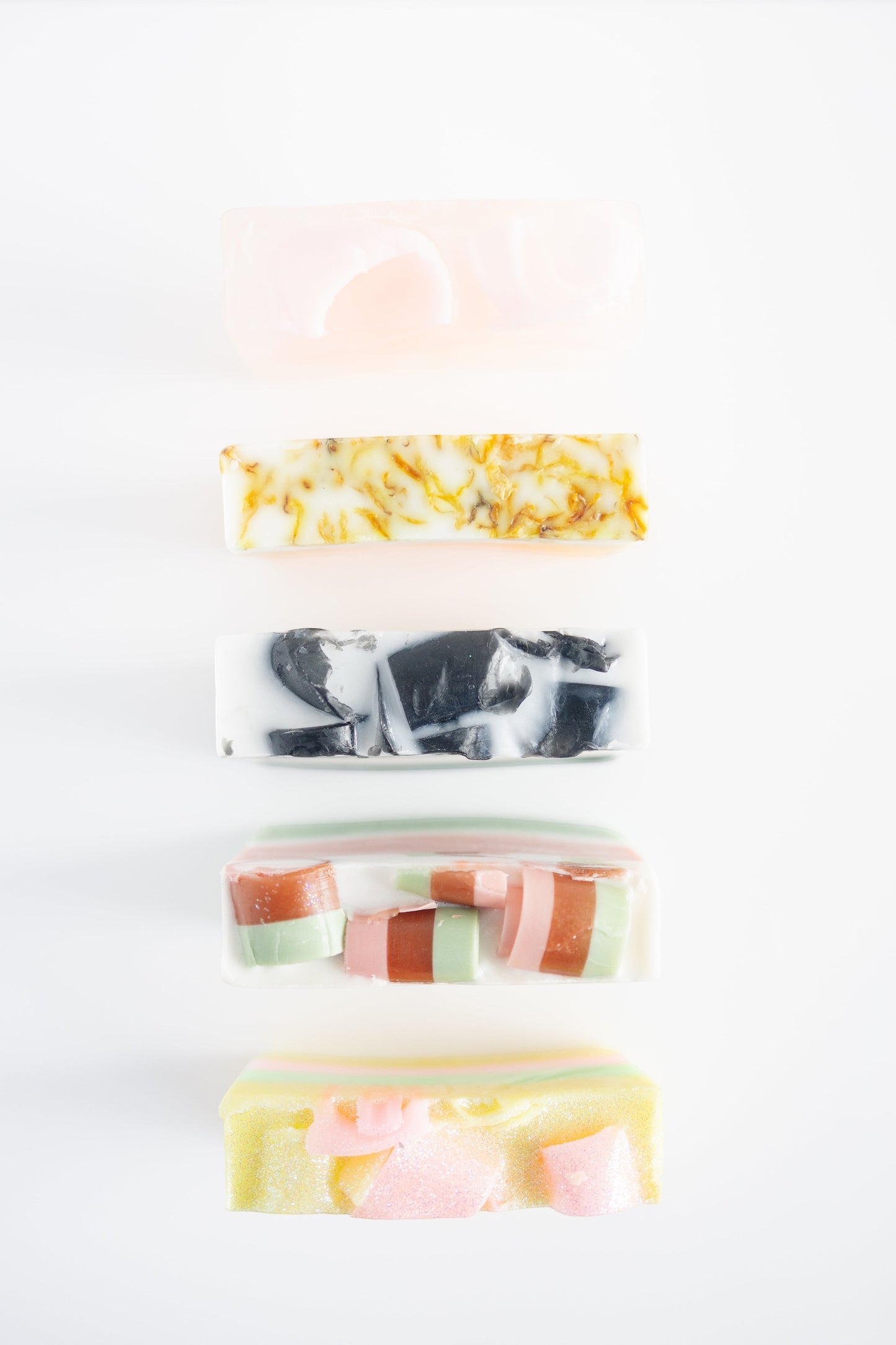 Harry’s Mama’s Faves: Lotions & Potions artisan handmade bar soaps in various colors and botanical textures