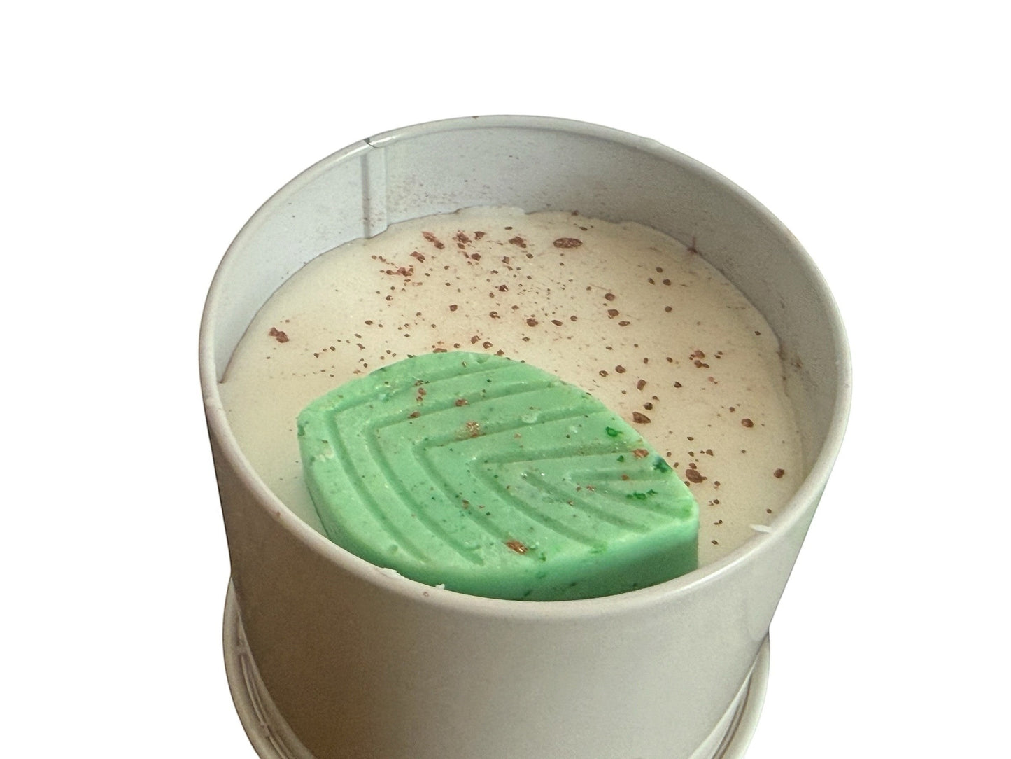 Harry’s Mama’s Faves: Lotions & Potions Dude, Bug Off! lotion candle in a tin with a decorative green leaf accent.
