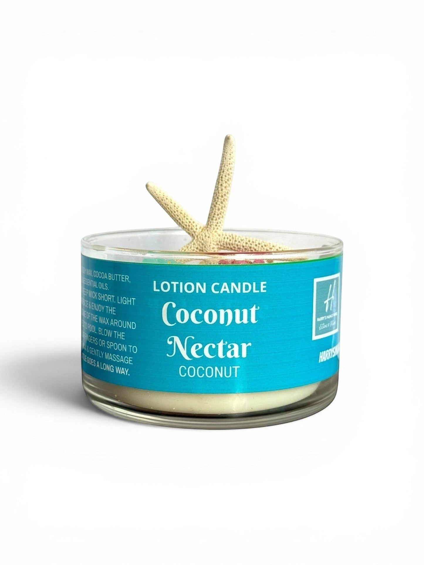 Harry’s Mama’s Faves: Lotions & Potions Coconut Nectar lotion candle with a starfish wax embed in a glass jar.