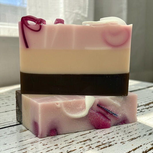 Harry’s Mama’s Faves: Lotions & Potions handmade Figs & Sugar bar soap with pink, cream, and dark brown layered design.