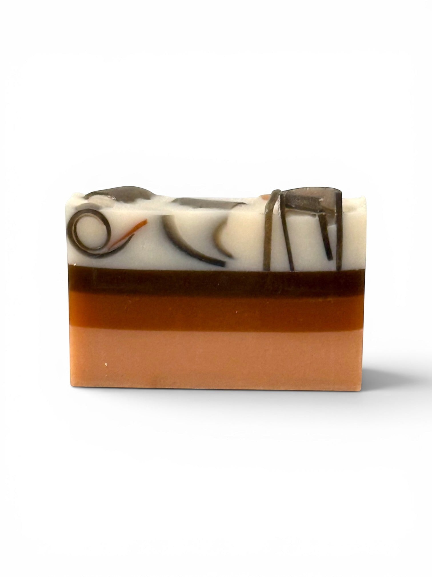 Harry’s Mama’s Faves: Lotions & Potions Hawaiian Coconut artisan handmade bar soap with layered brown and white tones.