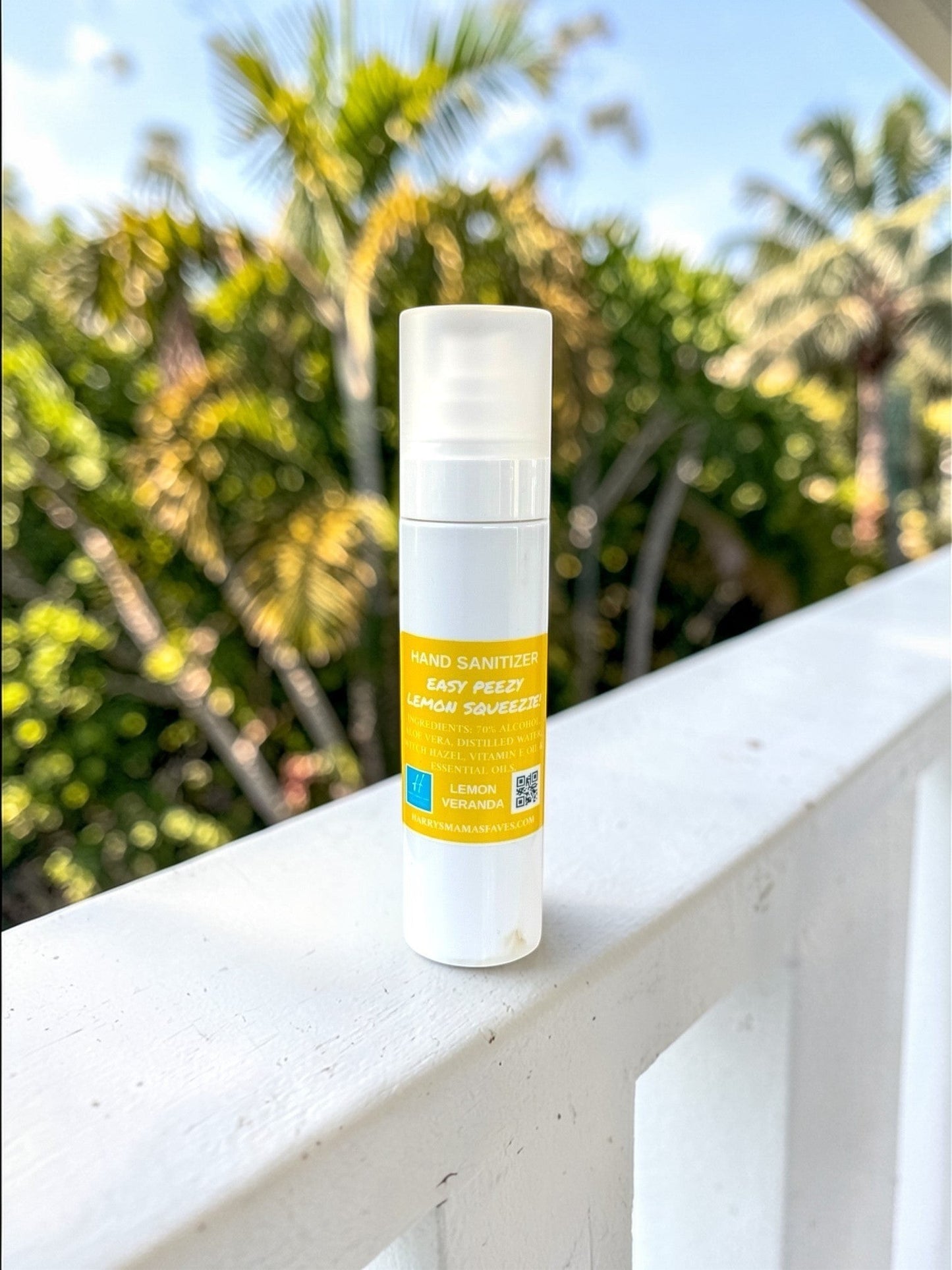 Harry’s Mama’s Faves: Lotions & Potions Easy Peezy Lemon Squeeze hand sanitizer spray in a white bottle outdoors.