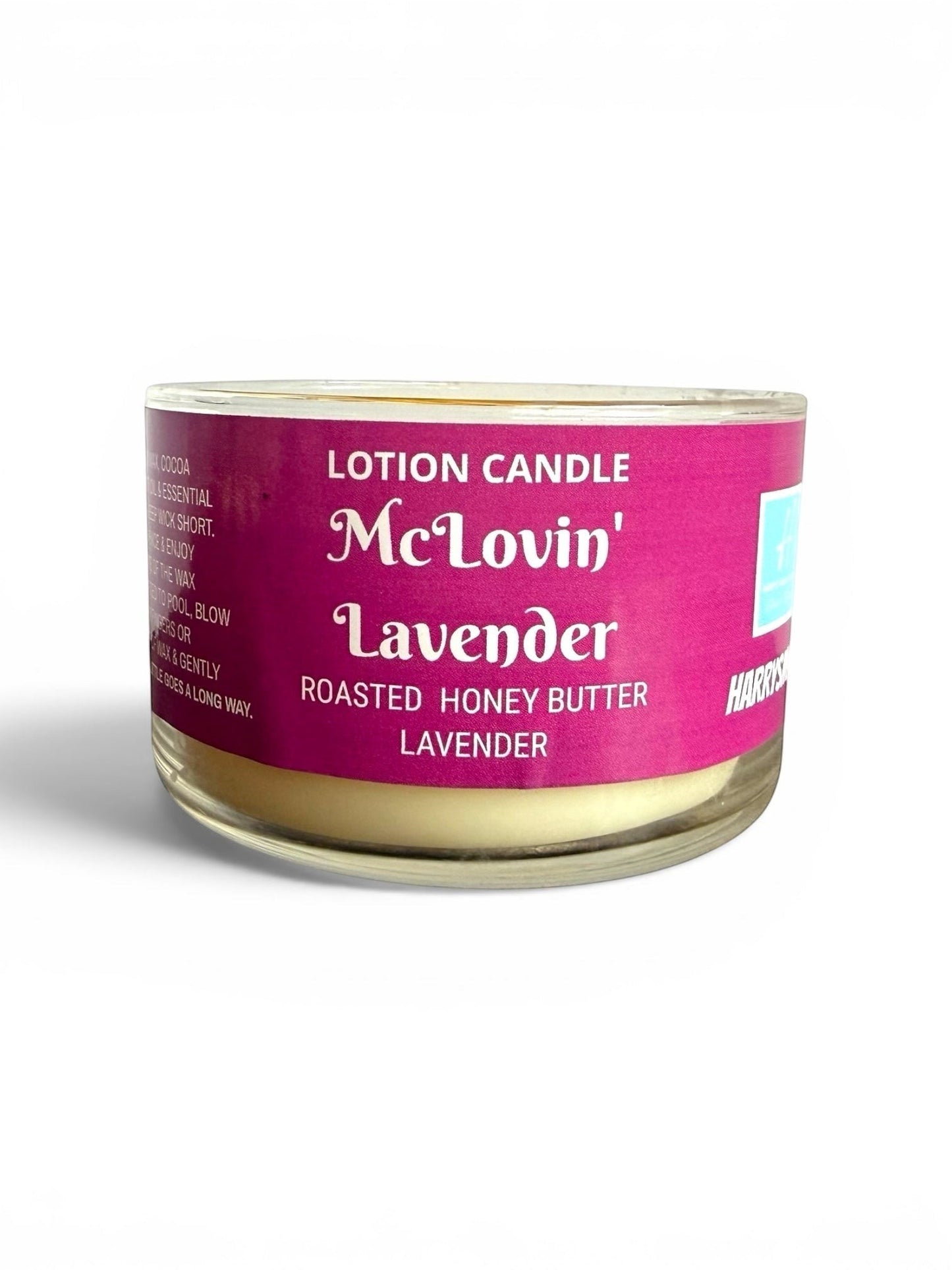 Harry’s Mama’s Faves: Lotions & Potions McLovin' Lavender lotion candle in a glass jar with a bright pink label.