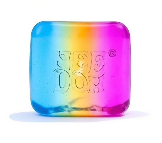 Harry’s Mama’s Faves: Lotions & Potions Nee Doh Nice Cube sensory fidget toy with a rainbow gradient squishy design.