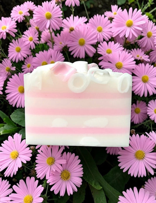 Harry’s Mama’s Faves: Lotions & Potions Pink Daisies handmade bar soap with white and pink stripes and floral accents.