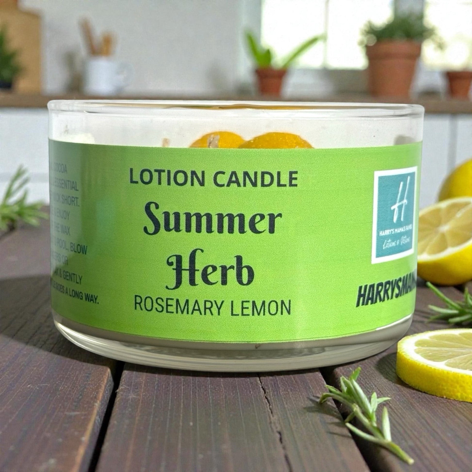 Harry’s Mama’s Faves: Lotions & Potions Summer Herb rosemary lemon lotion candle in a glass jar on a wooden table.
