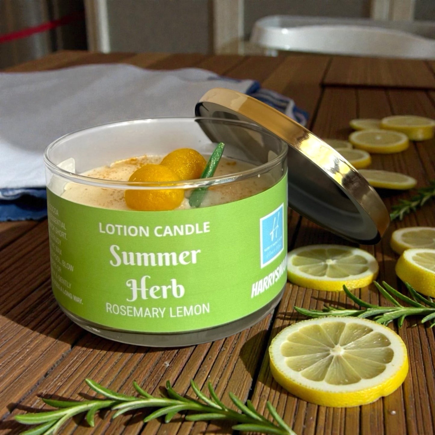 Harry’s Mama’s Faves: Lotions & Potions Summer Herb rosemary lemon massage lotion candle in a glass jar with lid.