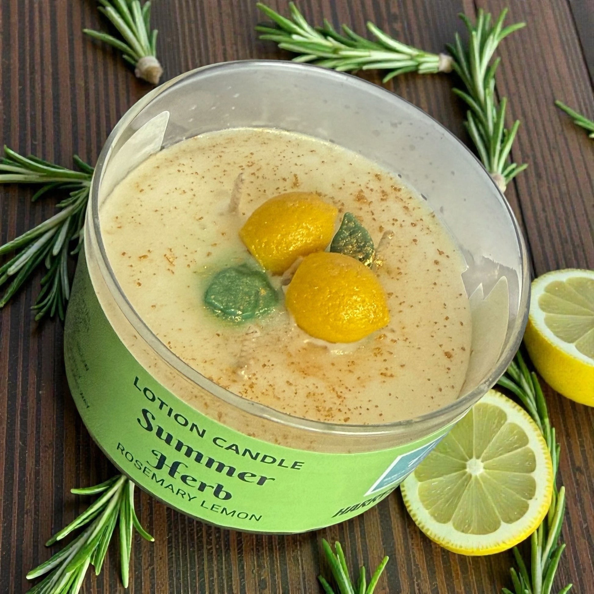 Harry’s Mama’s Faves: Lotions & Potions Summer Herb lotion candle with rosemary and lemon wax embeds in glass jar
