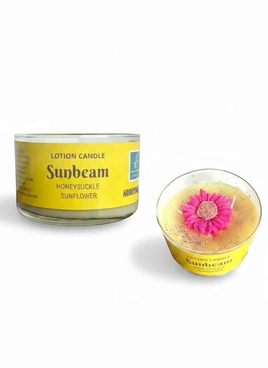 Harry’s Mama’s Faves: Lotions & Potions Sunbeam lotion candle with a decorative pink flower topper and yellow label.